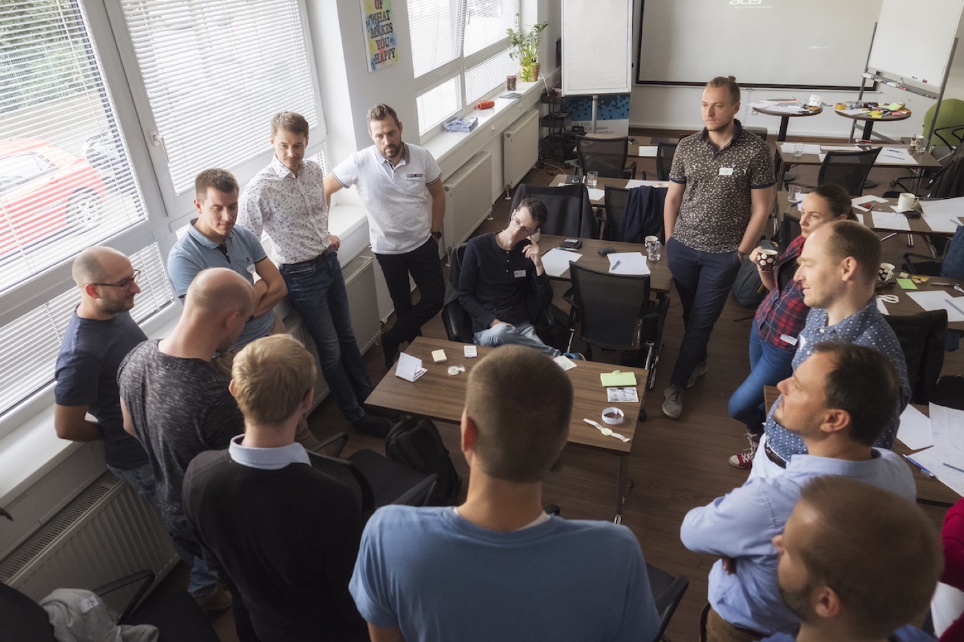Michal Juhas with participants during a hands-on group exercise (2018)