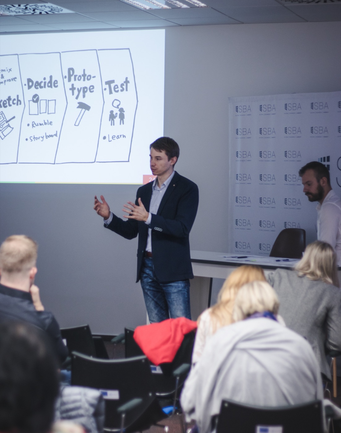 Michal Juhas presenting the design sprint process at the Slovak Business Agency (2018)